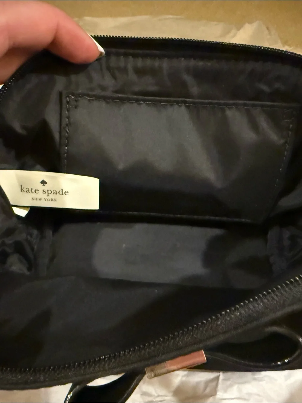 kate spade Black Cosmetic Pouch with Bow and Gold Plaque
